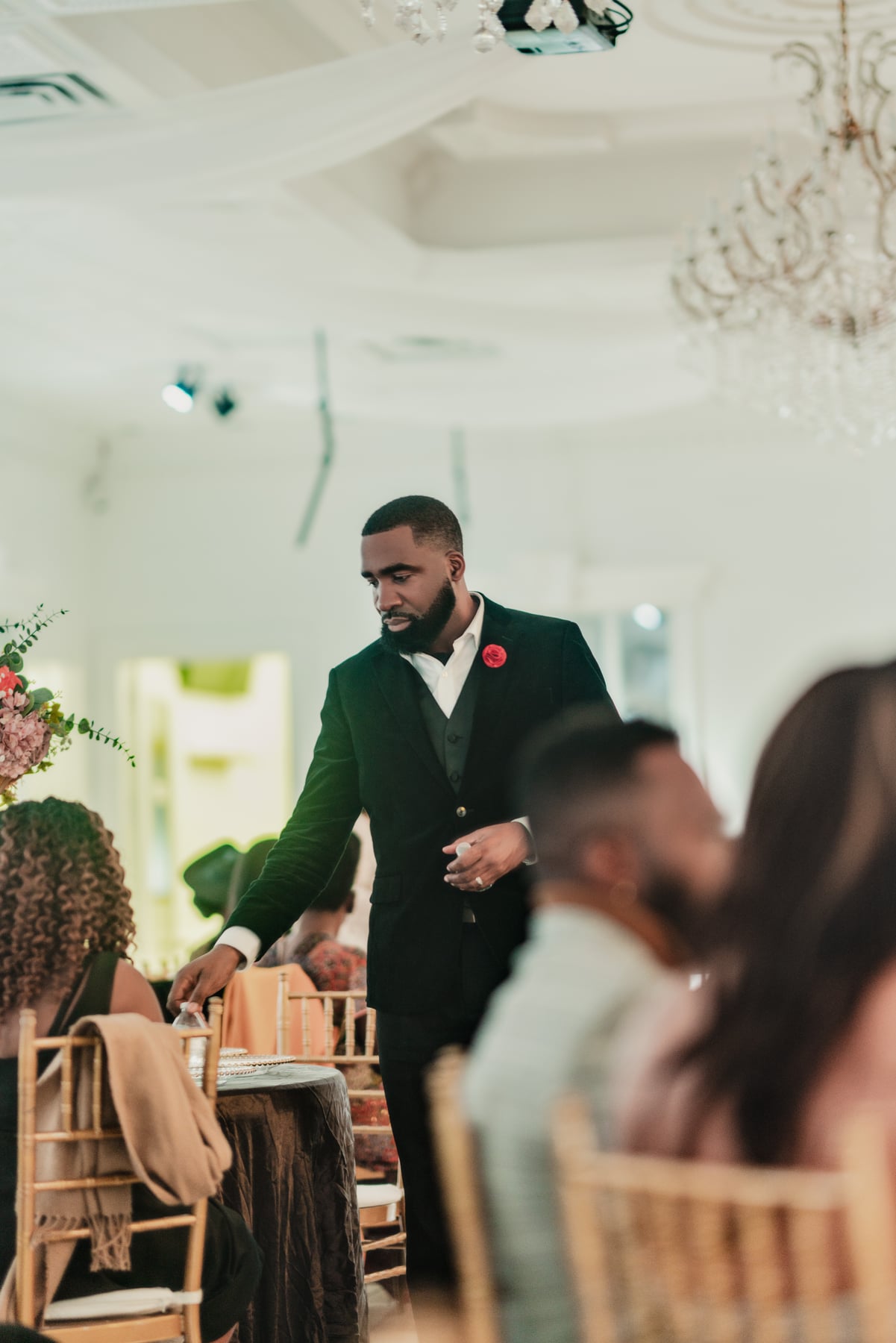 Guest in a formal suit at a gala